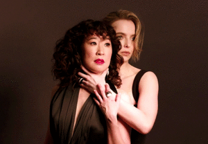 killing eve Villanelle Oksana (Jodie Comer) choking Eve Polastri (Sandra Oh) photo shoot